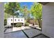Zen courtyard featuring mature trees and a tranquil seating area for peaceful outdoor enjoyment at 9 Greely Club Trl, Henderson, NV 89052