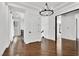 Elegant foyer with hardwood floors, modern lighting, and stylish interior doors at 9 Greely Club Trl, Henderson, NV 89052