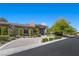 Lovely home featuring professional landscaping, mature trees, and elegant design elements at 9 Greely Club Trl, Henderson, NV 89052