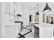 Stylish kitchen with stainless steel appliances, marble countertops, and ample cabinet space at 9 Greely Club Trl, Henderson, NV 89052