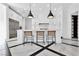 Open kitchen featuring marble floors, white cabinetry, and stainless steel appliances at 9 Greely Club Trl, Henderson, NV 89052