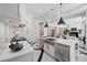 Spacious kitchen featuring stainless steel appliances and island sink at 9 Greely Club Trl, Henderson, NV 89052