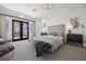 Inviting main bedroom featuring modern furnishings and a cozy fireplace view at 9 Greely Club Trl, Henderson, NV 89052