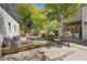 Relaxing patio with stylish furniture, hanging chairs and lush greenery creating a perfect outdoor retreat at 9 Greely Club Trl, Henderson, NV 89052