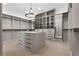 Well-organized walk-in closet featuring custom shelving and a central island at 9 Greely Club Trl, Henderson, NV 89052