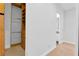 Walk-in closet with lots of shelving and rods for hanging clothes at 9 Greely Club Trl, Henderson, NV 89052