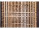 Interior view of a wine cellar with custom wooden shelving and storage racks at 9 Greely Club Trl, Henderson, NV 89052