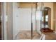 Modern glass shower features stone tile floor and clear glass enclosure, located off a large primary bathroom at 9173 Whitekirk Pl, Las Vegas, NV 89145