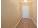 Inviting entryway featuring neutral walls, tile flooring, and a white front door at 9173 Whitekirk Pl, Las Vegas, NV 89145