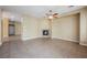 Open living area with tile flooring, neutral paint and a ceiling fan at 9173 Whitekirk Pl, Las Vegas, NV 89145