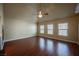 Large living area with vaulted ceiling, hardwood floors and abundant natural light at 9173 Whitekirk Pl, Las Vegas, NV 89145