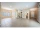 Expansive living room boasting tile floors and an abundance of natural light at 9173 Whitekirk Pl, Las Vegas, NV 89145