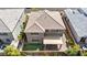 Aerial view of a home with a covered patio, landscaped backyard, and proximity to neighboring houses at 9370 Burning Sage Ave, Las Vegas, NV 89149
