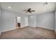 Large bedroom with neutral paint and attached bathroom and closet at 9370 Burning Sage Ave, Las Vegas, NV 89149