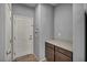 Entryway with tile floors, coat rack, and countertop with wooden cabinets at 9370 Burning Sage Ave, Las Vegas, NV 89149