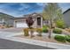 Charming single-Gathering home with beautifully landscaped front yard and two-car garage in a quiet neighborhood at 9370 Burning Sage Ave, Las Vegas, NV 89149