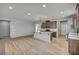 Open kitchen featuring an island, stainless appliances, and abundant recessed lighting at 9370 Burning Sage Ave, Las Vegas, NV 89149