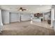 Spacious living room with carpet and plank floors, recessed lighting, and an open floor plan at 9370 Burning Sage Ave, Las Vegas, NV 89149