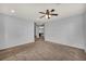 Bright living area offering ample space and neutral carpet, ready for personalization at 9370 Burning Sage Ave, Las Vegas, NV 89149