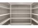 Walk-in pantry with multiple shelves and ample storage for groceries and kitchen essentials at 9370 Burning Sage Ave, Las Vegas, NV 89149