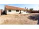 Exterior view of the backyard with a patio, and a block wall at 1185 Ponce De Leon Ave, Las Vegas, NV 89123