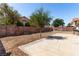 Spacious backyard with a concrete patio, privacy wall, and potential for landscaping and outdoor living at 1185 Ponce De Leon Ave, Las Vegas, NV 89123