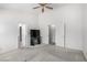 Bedroom features carpet floors, a TV, and a walk-in closet at 1185 Ponce De Leon Ave, Las Vegas, NV 89123