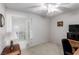 Bedroom with carpet and a desk, and a large window with blinds at 1185 Ponce De Leon Ave, Las Vegas, NV 89123
