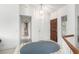 Inviting entryway with tile flooring, neutral walls and a classic chandelier for a warm welcome at 1185 Ponce De Leon Ave, Las Vegas, NV 89123