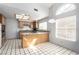 Bright kitchen featuring tile floors, wood cabinets, granite countertops and lots of natural light at 1185 Ponce De Leon Ave, Las Vegas, NV 89123