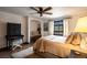 Bright bedroom featuring a cozy window seat, comfortable bed, and rustic decor at 1450 Rancho Cir, Las Vegas, NV 89107