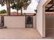 Property featuring a gravel driveway, tile roof, and gated entry for added privacy at 1450 Rancho Cir, Las Vegas, NV 89107