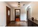 Hallway with decorative lighting leading to bathroom and other rooms at 1450 Rancho Cir, Las Vegas, NV 89107