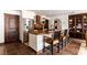 Eat-in kitchen features custom wood island, stainless steel appliances, and custom cabinets at 1450 Rancho Cir, Las Vegas, NV 89107