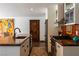 Open concept kitchen with stainless steel appliances and a copper island sink at 1450 Rancho Cir, Las Vegas, NV 89107