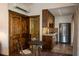 This mini-kitchen is connected to the bathroom and features beautiful wood cabinets at 1450 Rancho Cir, Las Vegas, NV 89107