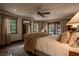 Serene bedroom with a luxurious bed, ample natural light, and stylish decor at 1450 Rancho Cir, Las Vegas, NV 89107