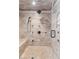 Spacious tile shower with a built-in bench and multiple shower heads at 1450 Rancho Cir, Las Vegas, NV 89107