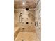 Luxurious walk-in shower featuring multiple shower heads and a built-in bench at 1450 Rancho Cir, Las Vegas, NV 89107