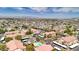 Aerial view of the neighborhood highlighting rooftops, streets, and nearby mountains at 5751 Hacienda Ave # 135, Las Vegas, NV 89122