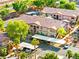 Aerial view of the community featuring multi-story buildings, mature landscaping, and covered parking at 5751 Hacienda Ave # 135, Las Vegas, NV 89122