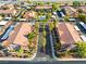 Aerial view showcases the well-maintained community with mature trees and covered parking at 5751 Hacienda Ave # 135, Las Vegas, NV 89122