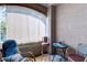 Cozy balcony with comfortable chairs and a small table, providing a relaxing outdoor space at 5751 Hacienda Ave # 135, Las Vegas, NV 89122