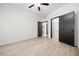 Bedroom with ample natural light and a view into an open closet at 5751 Hacienda Ave # 135, Las Vegas, NV 89122