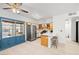 Bright kitchen features stainless steel appliances and a stylish island with seating at 5751 Hacienda Ave # 135, Las Vegas, NV 89122