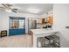 Bright kitchen features stainless steel appliances and a stylish island with seating at 5751 Hacienda Ave # 135, Las Vegas, NV 89122