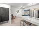 Inviting living room boasts natural light and a charming rocking chair at 5751 Hacienda Ave # 135, Las Vegas, NV 89122