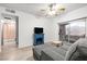 Cozy living room featuring a fireplace and sliding door to patio and comfortable seating at 5751 Hacienda Ave # 135, Las Vegas, NV 89122