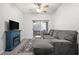 Comfortable living room with a fireplace and sliding doors to the patio at 5751 Hacienda Ave # 135, Las Vegas, NV 89122