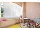 Relaxing screened patio with comfortable seating, offering a perfect spot for outdoor enjoyment at 5751 Hacienda Ave # 135, Las Vegas, NV 89122
